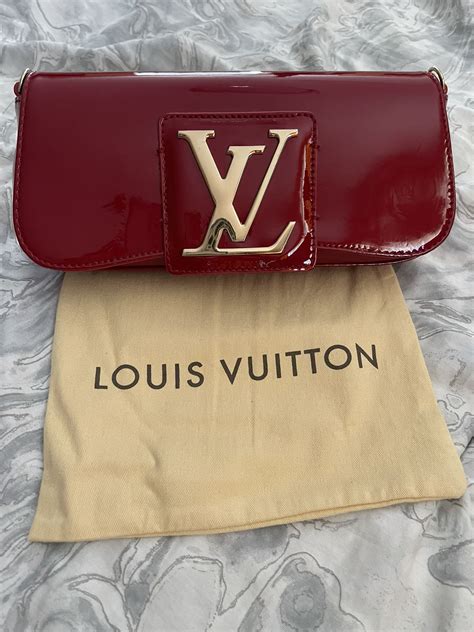 louis vuitton sobe clutch price|authentic louis vuitton clutch.